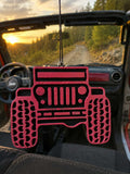 Pink Trail Rig Jeep-shaped car freshie hanging inside a Jeep at sunset on a dirt trail